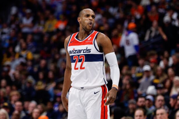 Jan 17, 2026; Denver, Colorado, USA; Washington Wizards forward Khris Middleton (22) reacts in the third quarter against the Denver Nuggets at Ball Arena. Mandatory Credit: Isaiah J. Downing-Imagn Images