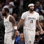 Feb 8, 2025; Dallas, Texas, USA; Dallas Mavericks guard Kyrie Irving (11) and forward Anthony Davis (3) during the game between the Dallas Mavericks and the Houston Rockets at the American Airlines Center. Mandatory Credit: Jerome Miron-Imagn Images