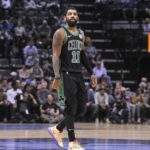 Boston Celtics guard Kyrie Irving (11) during the first half against the Memphis Grizzlies at FedExForum.