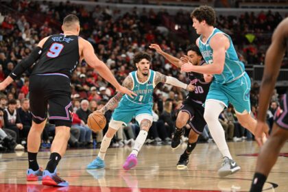 Jan 3, 2026; Chicago, Illinois, USA; Charlotte Hornets guard Lamelo Ball (1) drives the ball against Chicago Bulls guard Tre Jones (30) during the first half at United Center. Mandatory Credit: Patrick Gorski-Imagn Images