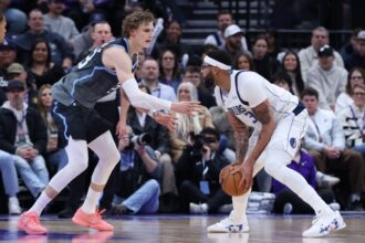 Jan 8, 2026; Salt Lake City, Utah, USA; Dallas Mavericks forward Anthony Davis (3) looks to drive against Utah Jazz forward Lauri Markkanen (23) during the second half at Delta Center. Mandatory Credit: Rob Gray-Imagn Images
