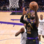 Jan 4, 2026; Los Angeles, California, USA; Los Angeles Lakers forward LeBron James (23) dribbles the ball during the first quarter against the Memphis Grizzlies at Crypto.com Arena. Mandatory Credit: Kiyoshi Mio-Imagn Images