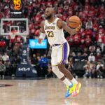 Dec 20, 2025; Inglewood, California, USA; Los Angeles Lakers forward LeBron James (23) dribbles the ball against the LA Clippers in the second half at Intuit Dome. Mandatory Credit: Kirby Lee-Imagn Images