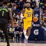 Jan 6, 2026; New Orleans, Louisiana, USA; Los Angeles Lakers forward LeBron James (23) brings the ball up court against New Orleans Pelicans forward Zion Williamson (1) during the first half at Smoothie King Center. Mandatory Credit: Stephen Lew-Imagn Images