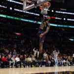 Jan 13, 2026; Los Angeles, California, USA; Los Angeles Lakers forward LeBron James (23) dunks the ball during the fourth quarter against the Atlanta Hawks at Crypto.com Arena. Mandatory Credit: Kiyoshi Mio-Imagn Images
