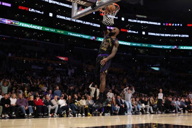Jan 13, 2026; Los Angeles, California, USA; Los Angeles Lakers forward LeBron James (23) dunks the ball during the fourth quarter against the Atlanta Hawks at Crypto.com Arena. Mandatory Credit: Kiyoshi Mio-Imagn Images