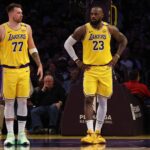 Los Angeles Lakers guard Luka Doncic (77) and forward LeBron James (23) during the second quarter against the Minnesota Timberwolves at Crypto.com Arena.