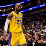 Jan 6, 2026; New Orleans, Louisiana, USA; Los Angeles Lakers forward LeBron James (23) returns to the bench against the New Orleans Pelicans during the second half at Smoothie King Center. Mandatory Credit: Stephen Lew-Imagn Images
