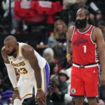 Dec 20, 2025; Inglewood, California, USA; Los Angeles Lakers forward Lebron James (23) and LA Clippers guard James Harden (1) react in the first half at Intuit Dome. Mandatory Credit: Kirby Lee-Imagn Images