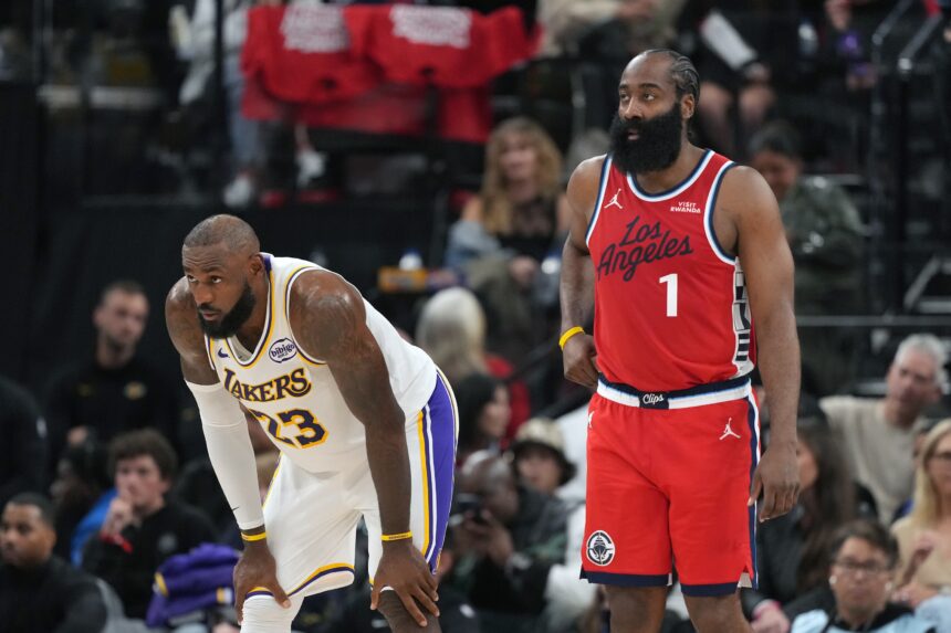 Dec 20, 2025; Inglewood, California, USA; Los Angeles Lakers forward Lebron James (23) and LA Clippers guard James Harden (1) react in the first half at Intuit Dome. Mandatory Credit: Kirby Lee-Imagn Images