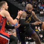Jan 22, 2026; Inglewood, California, USA; Los Angeles Clippers center Ivica Zubac (40) defends Los Angeles Lakers forward LeBron James (23) as he drives to the basket in the second half at Intuit Dome. Mandatory Credit: Jayne Kamin-Oncea-Imagn Images