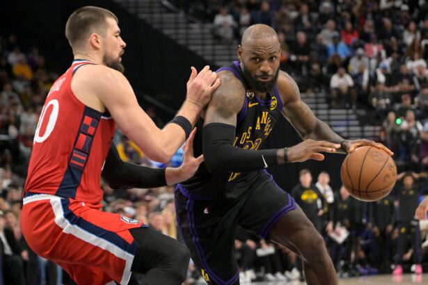 Jan 22, 2026; Inglewood, California, USA; Los Angeles Clippers center Ivica Zubac (40) defends Los Angeles Lakers forward LeBron James (23) as he drives to the basket in the second half at Intuit Dome. Mandatory Credit: Jayne Kamin-Oncea-Imagn Images