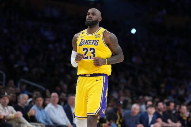 Jan 15, 2026; Los Angeles, California, USA; Los Angeles Lakers forward LeBron James (23) reacts against the Charlotte Hornets in the first half at Crypto.com Arena. Mandatory Credit: Kirby Lee-Imagn Images