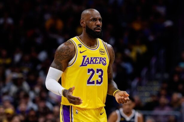 Jan 20, 2026; Denver, Colorado, USA; Los Angeles Lakers forward LeBron James (23) reacts after a play in the first quarter against the Denver Nuggets at Ball Arena. Mandatory Credit: Isaiah J. Downing-Imagn Images