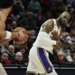 Los Angeles Lakers forward LeBron James (23) looks back at Portland Trail Blazers forward Toumani Camara (33) during the second half at Moda Center.