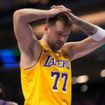 Jan 12, 2026; Sacramento, California, USA; Los Angeles Lakers guard Luka Doncic (77) reacts after being fouled against the Sacramento Kings in the second quarter at the Golden 1 Center. Mandatory Credit: Cary Edmondson-Imagn Images