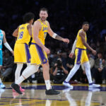 Jan 15, 2026; Los Angeles, California, USA; Los Angeles Lakers guard Luka Doncic (77) reacts against the Charlotte Hornets in the first half at Crypto.com Arena. Mandatory Credit: Kirby Lee-Imagn Images