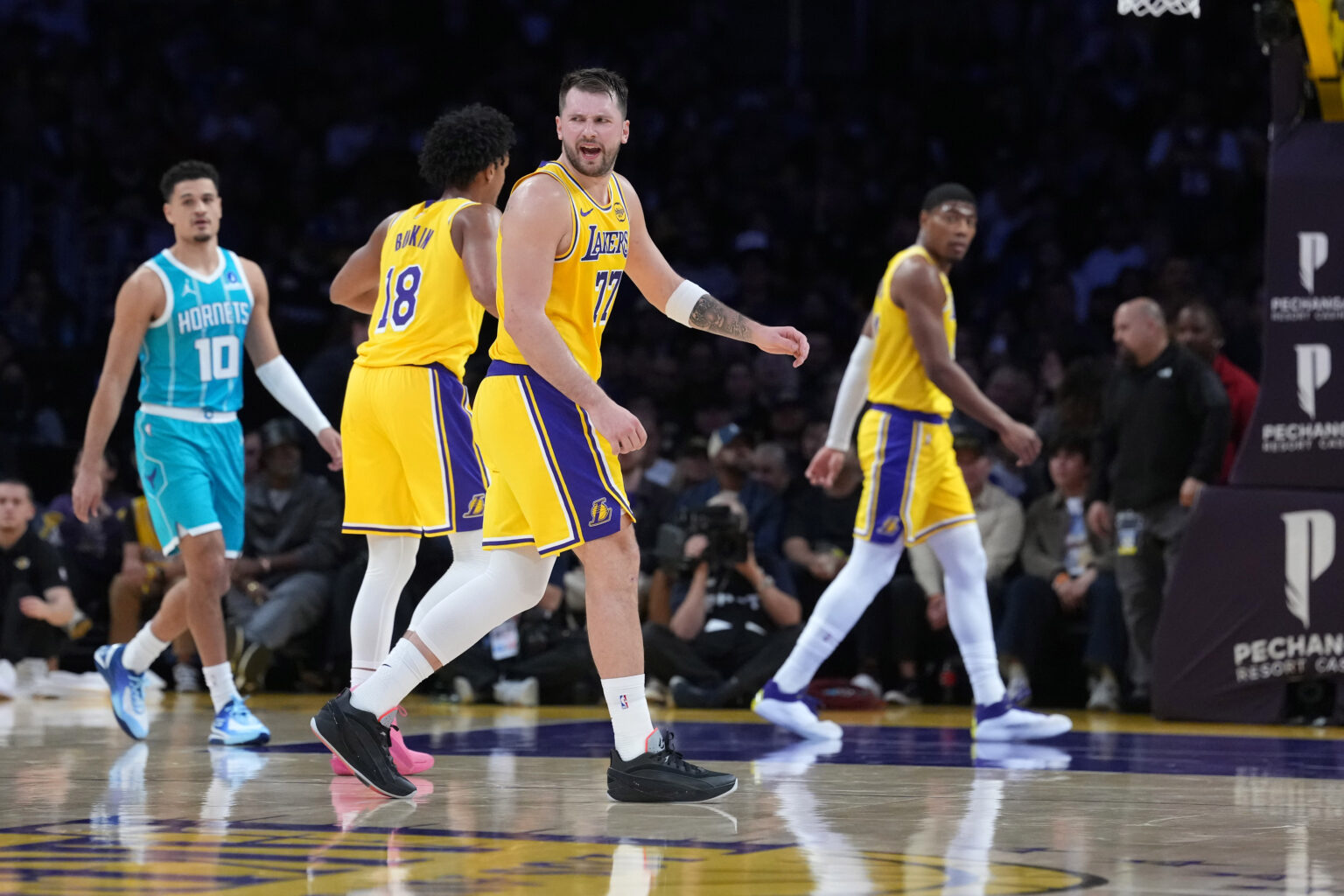 Jan 15, 2026; Los Angeles, California, USA; Los Angeles Lakers guard Luka Doncic (77) reacts against the Charlotte Hornets in the first half at Crypto.com Arena. Mandatory Credit: Kirby Lee-Imagn Images