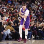 Jan 26, 2026; Chicago, Illinois, USA; Los Angeles Lakers guard Luka Doncic (77) reacts after scoring against the Chicago Bulls during the first half at United Center. Mandatory Credit: Kamil Krzaczynski-Imagn Images