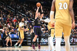 Jan 30, 2026; Washington, District of Columbia, USA; Los Angeles Lakers forward/guard Luka Doncic (77) shoots against the Washington Wizards during the second half at Capital One Arena. Mandatory Credit: Brad Mills-Imagn Images