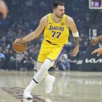 Jan 28, 2026; Cleveland, Ohio, USA; Los Angeles Lakers guard Luka Doncic (77) dribbles the ball in the first quarter against the Cleveland Cavaliers at Rocket Arena. Mandatory Credit: David Richard-Imagn Images
