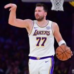 Jan 18, 2026; Los Angeles, California, USA; Los Angeles Lakers guard Luka Doncic (77) moves the ball down court against the Toronto Raptors during the first half at Crypto.com Arena. Mandatory Credit: Gary A. Vasquez-Imagn Images