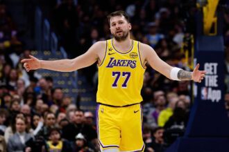 Jan 20, 2026; Denver, Colorado, USA; Los Angeles Lakers guard Luka Doncic (77) reacts after a play in the third quarter against the Denver Nuggets at Ball Arena. Mandatory Credit: Isaiah J. Downing-Imagn Images