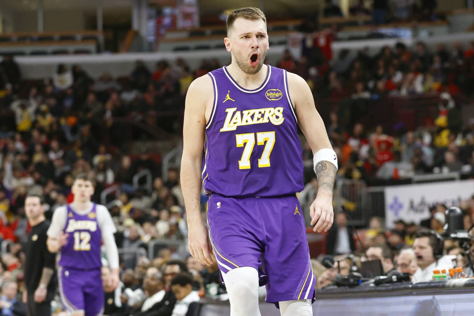 Jan 26, 2026; Chicago, Illinois, USA; Los Angeles Lakers guard Luka Doncic (77) reacts after scoring against the Chicago Bulls during the second half at United Center. Mandatory Credit: Kamil Krzaczynski-Imagn Images