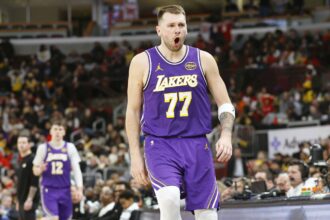Jan 26, 2026; Chicago, Illinois, USA; Los Angeles Lakers guard Luka Doncic (77) reacts after scoring against the Chicago Bulls during the second half at United Center. Mandatory Credit: Kamil Krzaczynski-Imagn Images