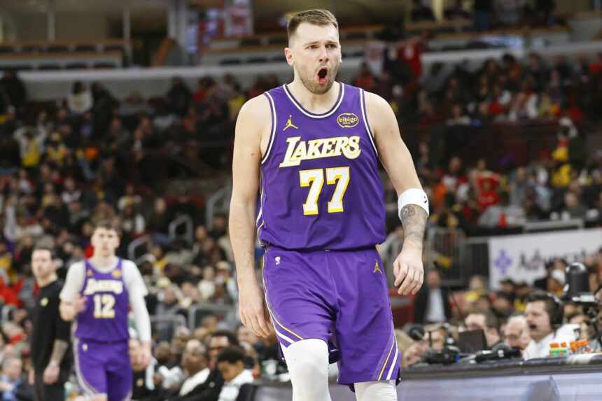 Jan 26, 2026; Chicago, Illinois, USA; Los Angeles Lakers guard Luka Doncic (77) reacts after scoring against the Chicago Bulls during the second half at United Center. Mandatory Credit: Kamil Krzaczynski-Imagn Images