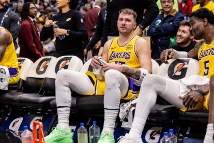 Jan 6, 2026; New Orleans, Louisiana, USA; Los Angeles Lakers forward/guard Luka Doncic (77) sits on a the bench against the New Orleans Pelicans during the second half at Smoothie King Center. Mandatory Credit: Stephen Lew-Imagn Images