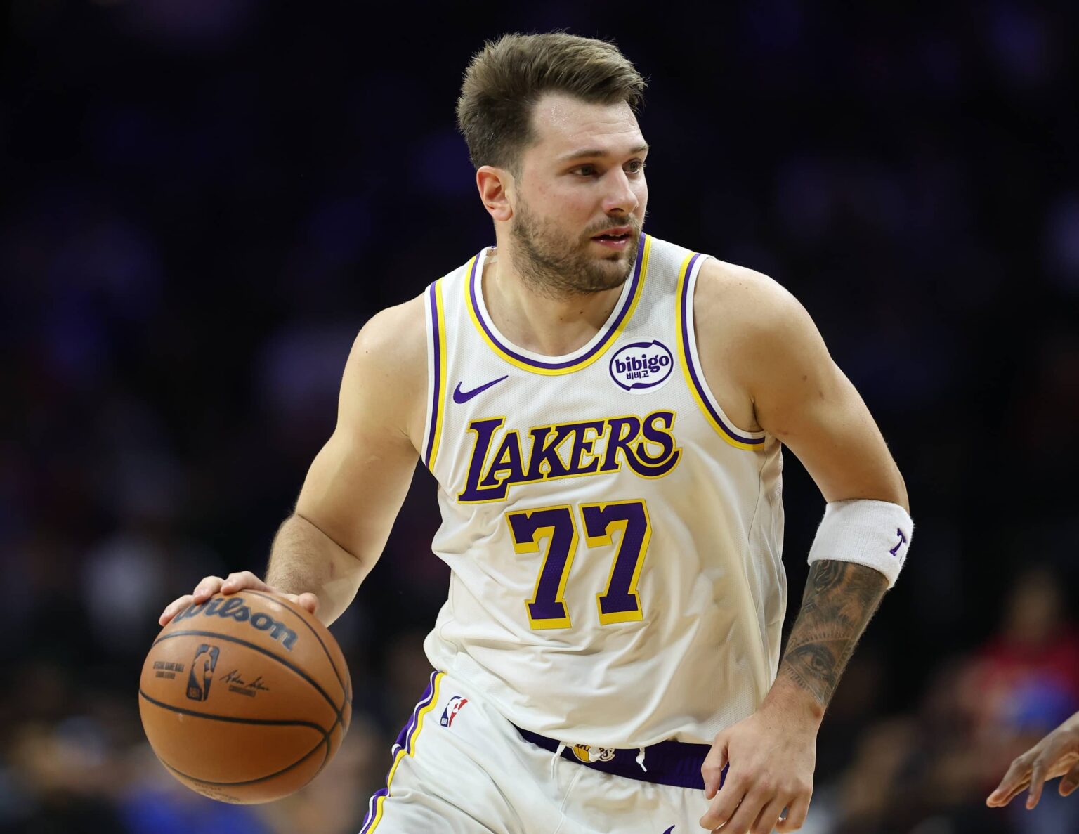 Los Angeles Lakers guard Luka Doncic (77) plays against the Philadelphia 76ers during the first quarter at Xfinity Mobile Arena.