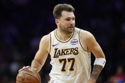 Los Angeles Lakers guard Luka Doncic (77) plays against the Philadelphia 76ers during the first quarter at Xfinity Mobile Arena.