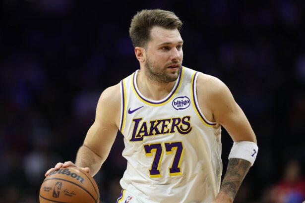 Los Angeles Lakers guard Luka Doncic (77) plays against the Philadelphia 76ers during the first quarter at Xfinity Mobile Arena.