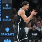 Oct 24, 2025; Brooklyn, New York, USA; Brooklyn Nets forward Michael Porter Jr. (17) celebrates during a timeout in the fourth quarter against the Cleveland Cavaliers at Barclays Center. Mandatory Credit: Wendell Cruz-Imagn Images