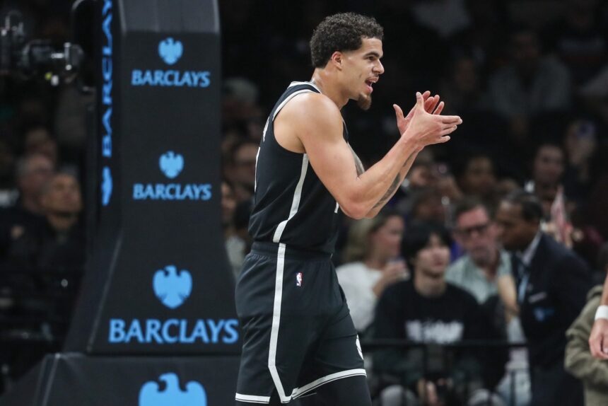 Oct 24, 2025; Brooklyn, New York, USA; Brooklyn Nets forward Michael Porter Jr. (17) celebrates during a timeout in the fourth quarter against the Cleveland Cavaliers at Barclays Center. Mandatory Credit: Wendell Cruz-Imagn Images