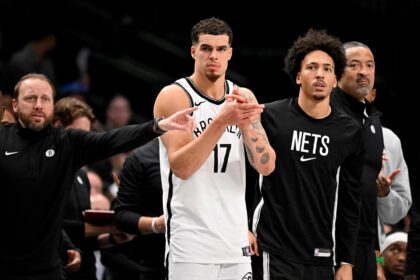 Dec 12, 2025; Dallas, Texas, USA; Brooklyn Nets forward Michael Porter Jr. (17) looks on from the team bench during the second half against the Dallas Mavericks at the American Airlines Center. Mandatory Credit: Jerome Miron-Imagn Images
