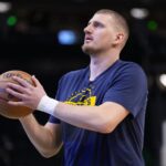 Jan 23, 2026; Milwaukee, Wisconsin, USA; Denver Nuggets center Nikola Jokic (15) during warmups prior to the game against the Milwaukee Bucks at Fiserv Forum. Mandatory Credit: Jeff Hanisch-Imagn Images