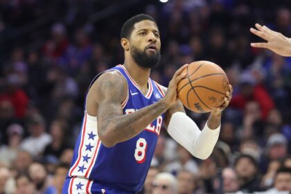 Philadelphia 76ers forward Paul George (8) shoots the ball against the Milwaukee Bucks during the third quarter at Xfinity Mobile Arena.
