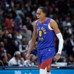 Denver Nuggets guard Peyton Watson (8) reacts to making a basket against the New Orleans Pelicans during the fourth quarter at Smoothie King Center.