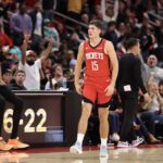 Jan 20, 2026; Houston, Texas, USA; Houston Rockets guard Reed Sheppard (15) reacts to his basket against the San Antonio Spurs in the second half at Toyota Center. Mandatory Credit: Thomas Shea-Imagn Images