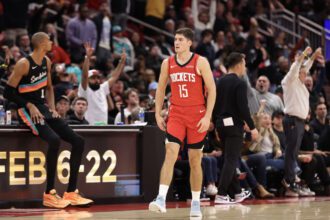 Jan 20, 2026; Houston, Texas, USA; Houston Rockets guard Reed Sheppard (15) reacts to his basket against the San Antonio Spurs in the second half at Toyota Center. Mandatory Credit: Thomas Shea-Imagn Images