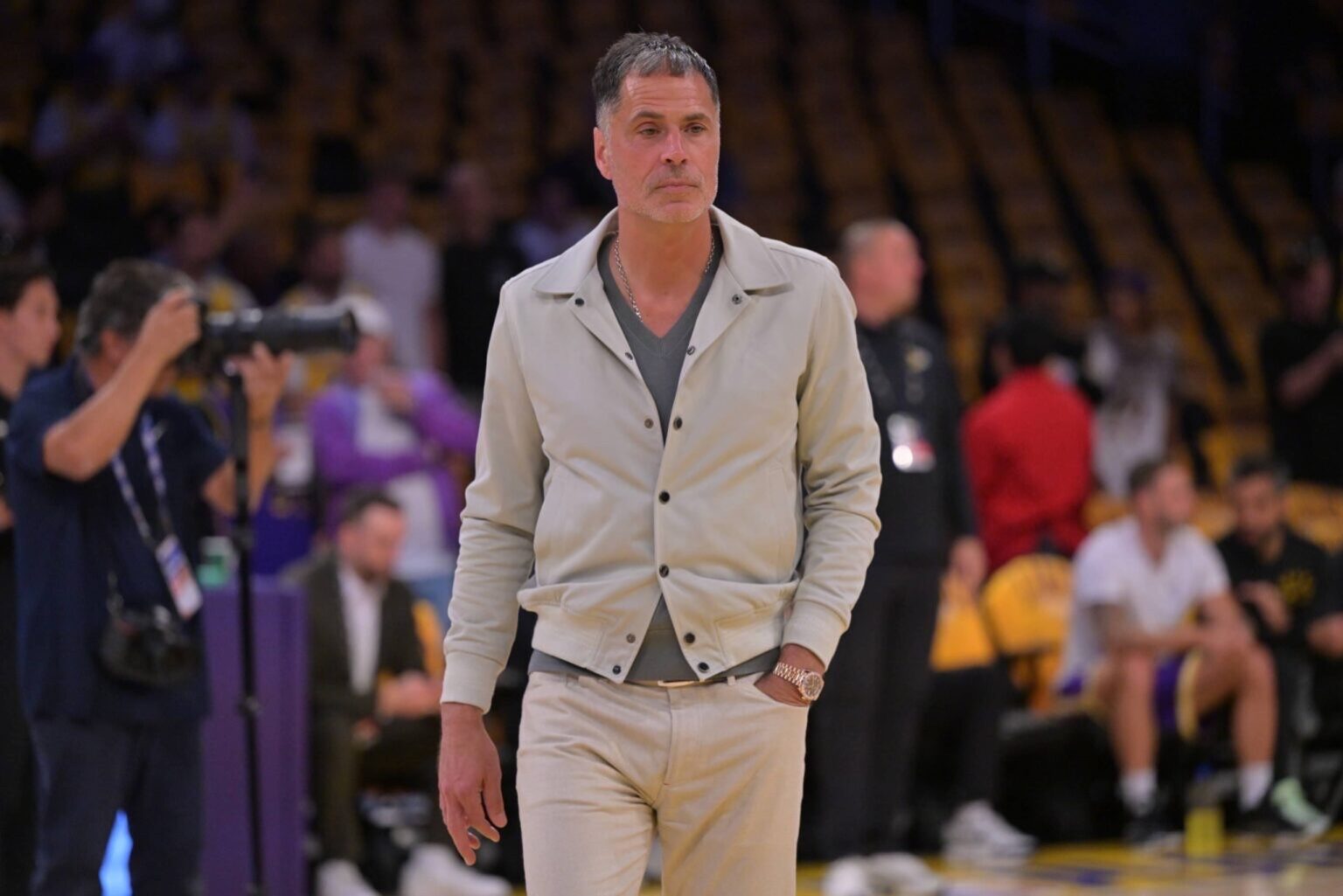 Apr 19, 2025; Los Angeles, California, USA; Los Angeles Lakers general manager Rob Pelinka walks on the couet prior to the game against the Minnesota Timberwolves at Crypto.com Arena. Mandatory Credit: Jayne Kamin-Oncea-Imagn Images