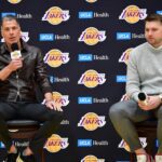 Feb 4, 2025; El Segundo, CA, USA; Los Angeles Lakers vice president of basketball operations and general manager Rob Pelinka introduces guard Luka Doncic at UCLA Health Training Center. Mandatory Credit: Gary A. Vasquez-Imagn Images