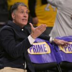 Los Angeles Lakers general manager Rob Pelinka looks on as players warm up prior to the game against the Orlando Magic at Crypto.com Arena.