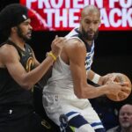 Jan 8, 2026; Minneapolis, Minnesota, USA; Cleveland Cavaliers center Jarrett Allen (31) defends against Minnesota Timberwolves center Rudy Gobert (27) him in the first quarter at Target Center. Mandatory Credit: Bruce Kluckhohn-Imagn Images