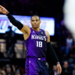Jan 16, 2026; Sacramento, California, USA; Sacramento Kings guard Russell Westbrook (18) points to the bench during the fourth quarter against the Washington Wizards at Golden 1 Center. Mandatory Credit: Sergio Estrada-Imagn Images