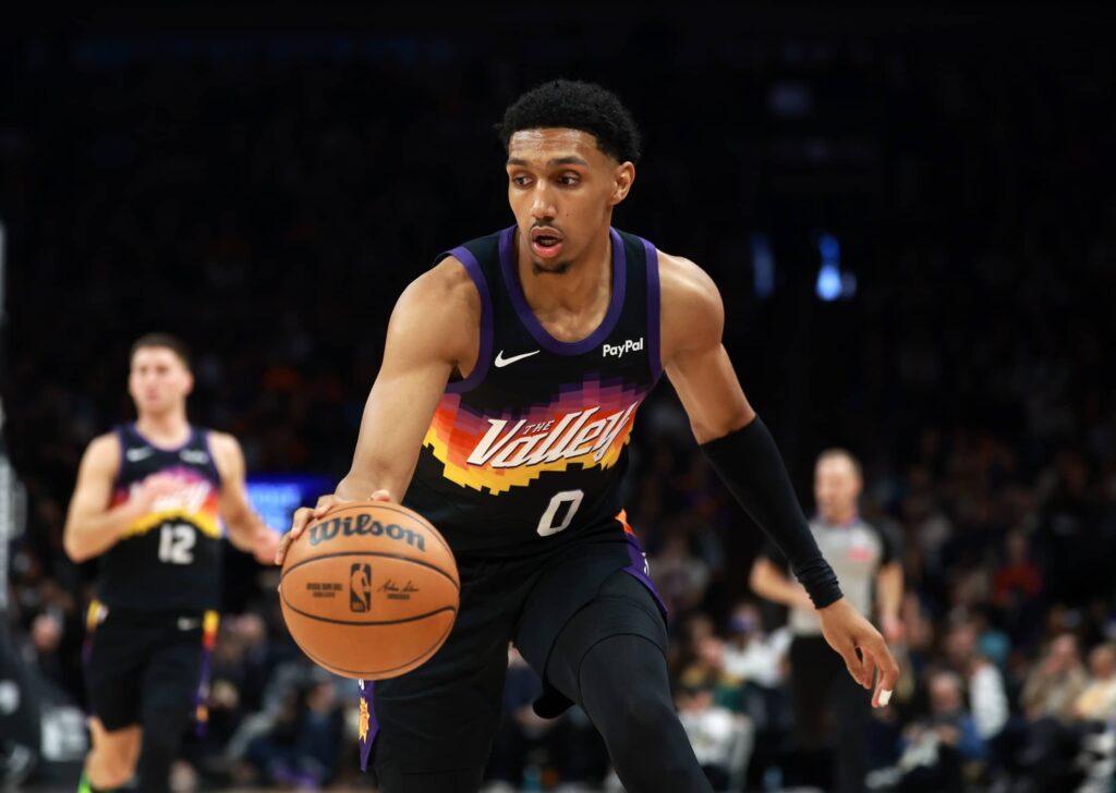 Jan 9, 2026; Phoenix, Arizona, USA; Phoenix Suns forward Ryan Dunn (0) against the New York Knicks at Mortgage Matchup Center. Mandatory Credit: Mark J. Rebilas-Imagn Images