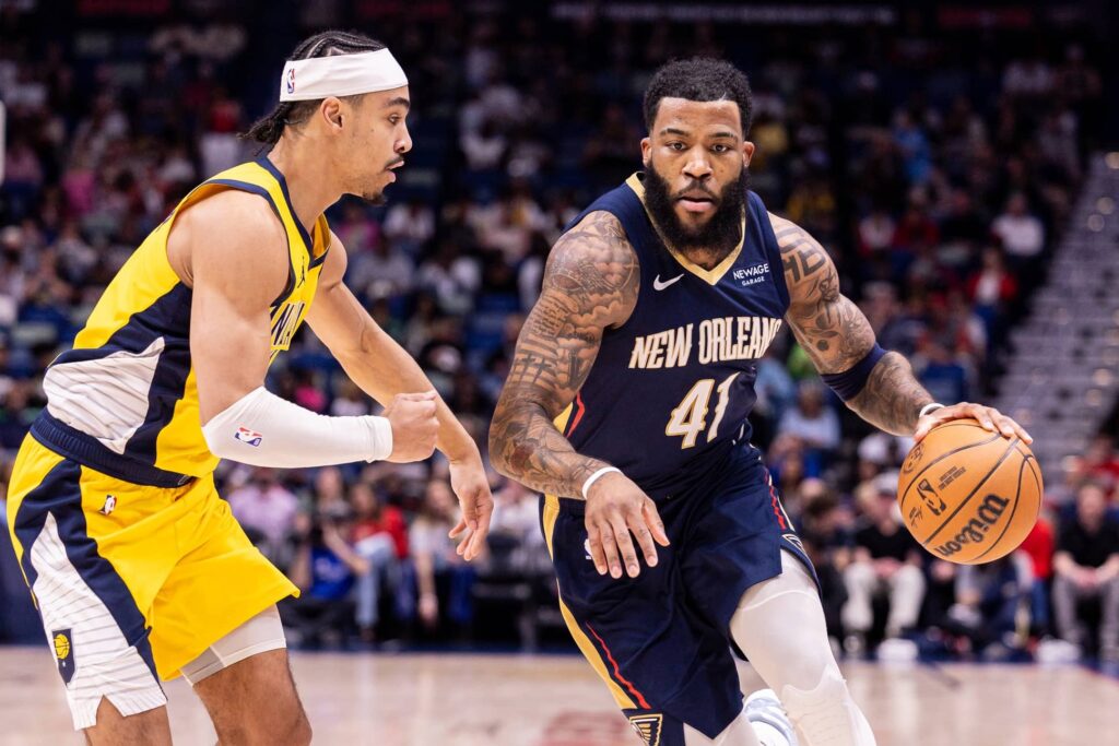 Dec 20, 2025; New Orleans, Louisiana, USA; New Orleans Pelicans guard/forward Saddiq Bey (41) dribbles against Indiana Pacers guard/forward Andrew Nembhard (2) during the first half at Smoothie King Center. Mandatory Credit: Stephen Lew-Imagn Images