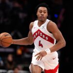 Nov 29, 2025; Charlotte, North Carolina, USA; Toronto Raptors forward Scottie Barnes (4) brings the ball up court against the Charlotte Hornets during the second half at Spectrum Center. Mandatory Credit: Jim Dedmon-Imagn Images